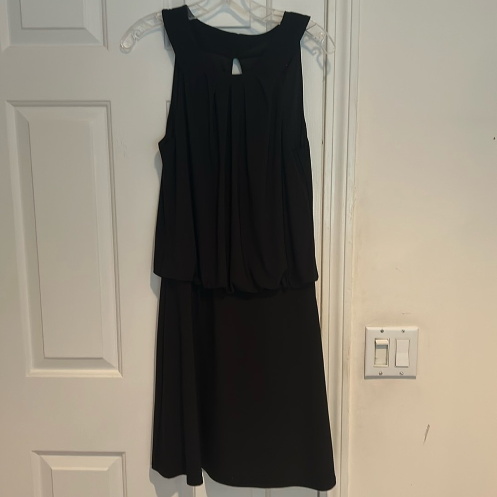 White House Black Market black dress. Top top is blousy with full skirt.